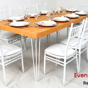Isadora-rectangular-dining-table-and-white-chivari-chairs-rental