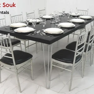 isadora-black-dining-table-with-silver-chivari-chairs-rental (1)